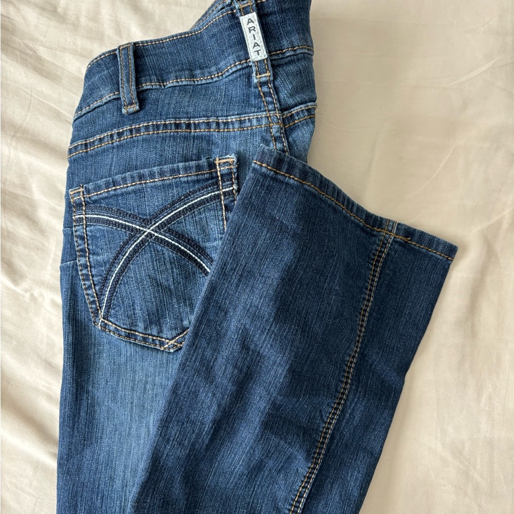 jeans 2 pair light and dark wash same size